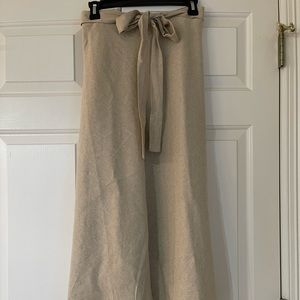 Khaki linen skirt. Picture perfect! Cute front slit for a little extra style.